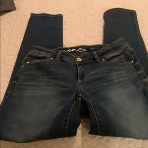 Super soft dark wash skinny leg jeans .